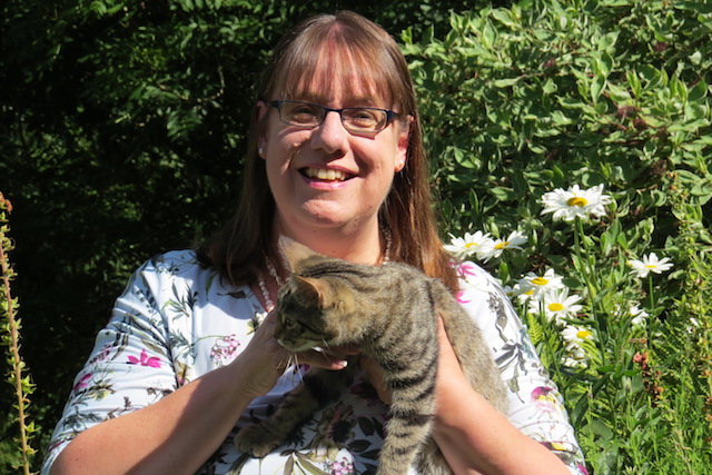 This Helen of Kernow Kitties smiling at you and holding Claudius when he was only kitten cat and clearly keen to be off to see what the World had to offer him in the way of excitement.